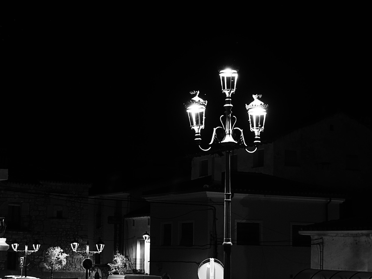 black and white, street lamp, people